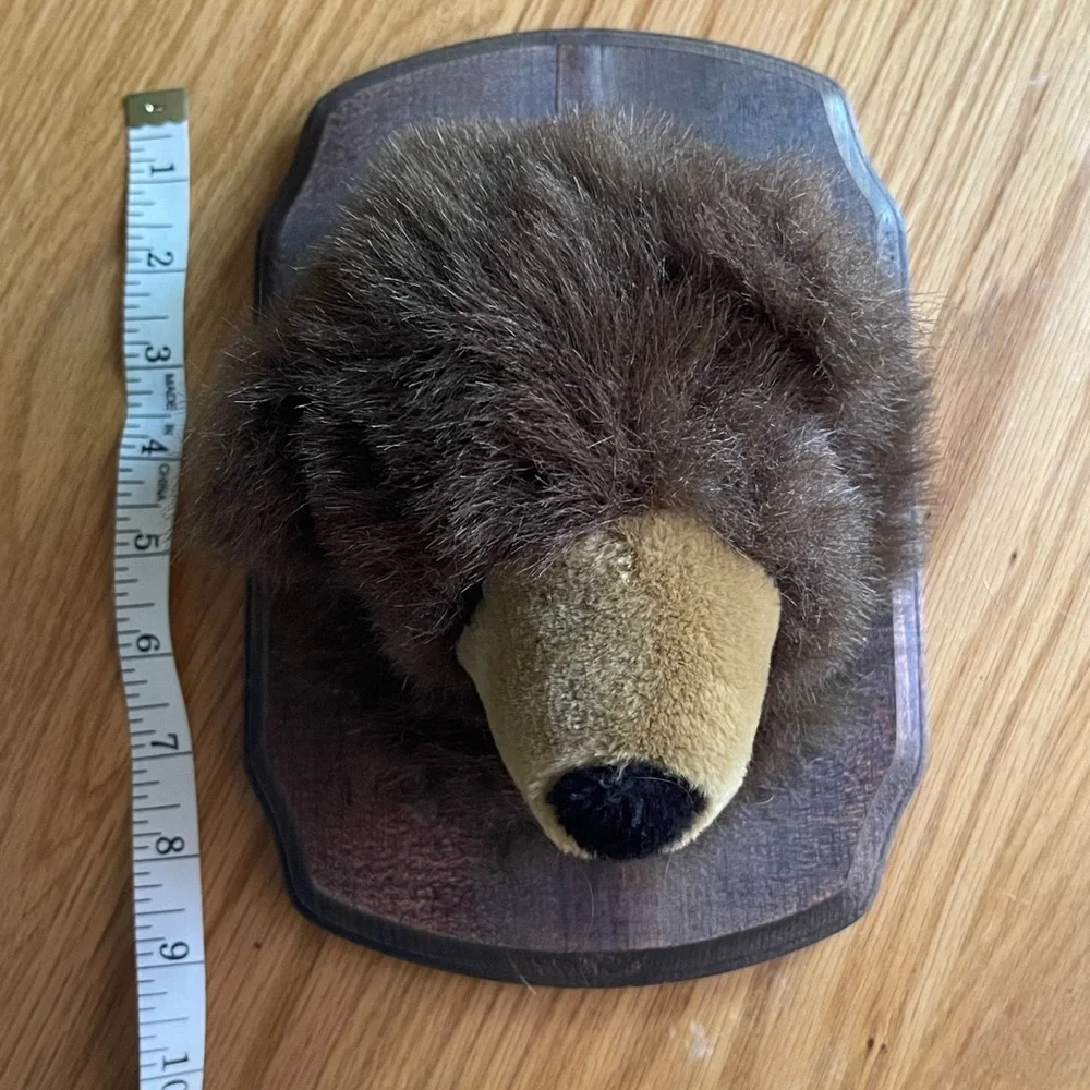 Plush mounted animal heads. Kids room - cabin  humor